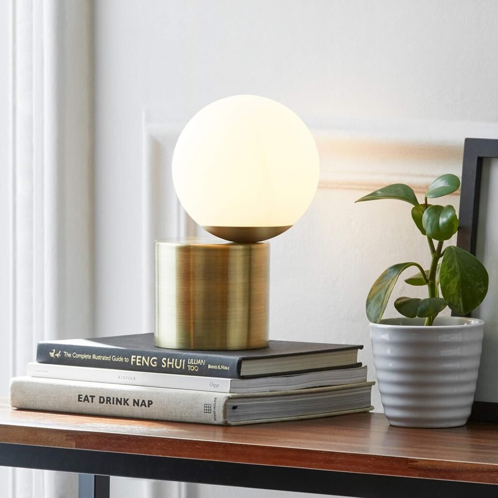 Amazon Brand – Rivet Modern Glass Globe Living Room Table Desk Lamp With LED Light Bulb - 7 x 10 Inches, Brass Finish